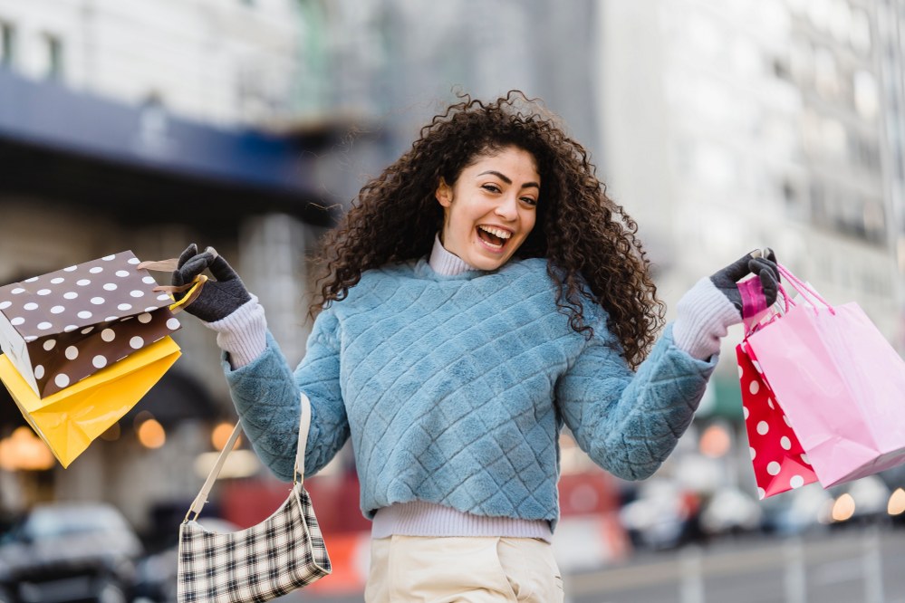 young mum with shopping bags