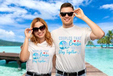 couple wearing a matching cruise t-shirt while on the beach