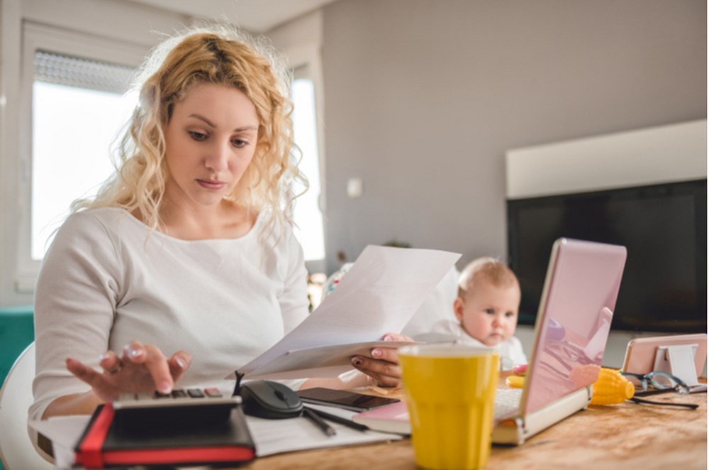 single mother calculating her finances