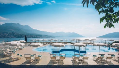 view of pool and beach from the hotel